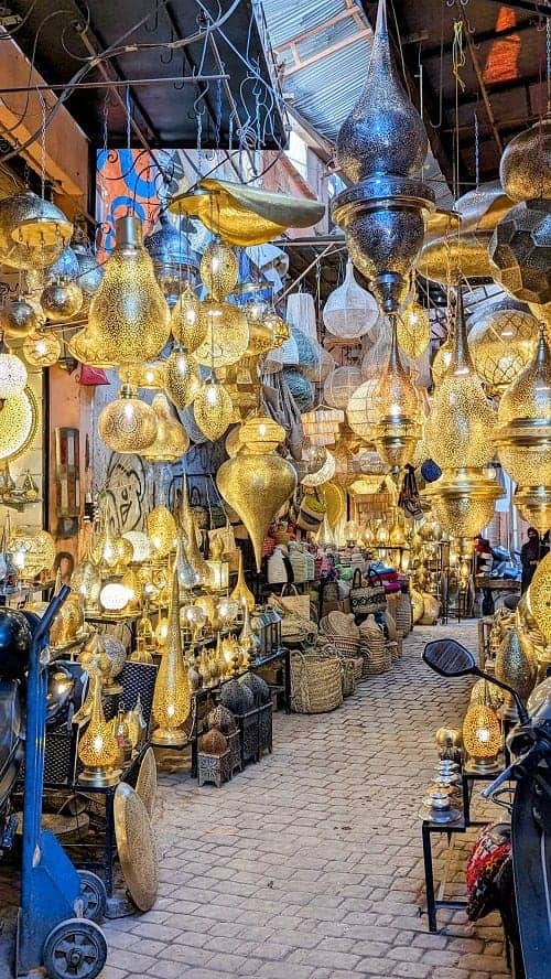 hanging bronze lights in a medina in morocco