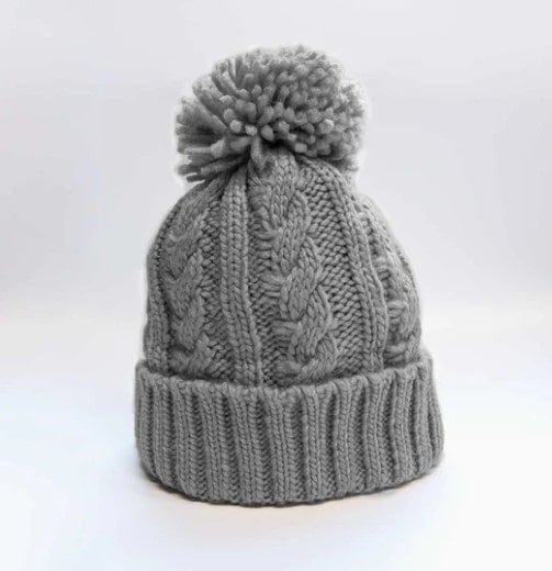 a gray winter beanie hat with a pom pom made without wool