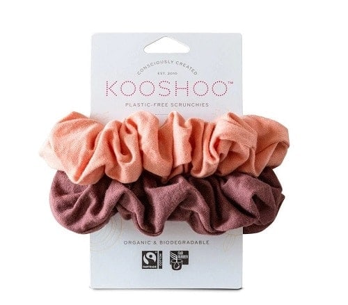 pink and purple hair scrunchies on a white tag