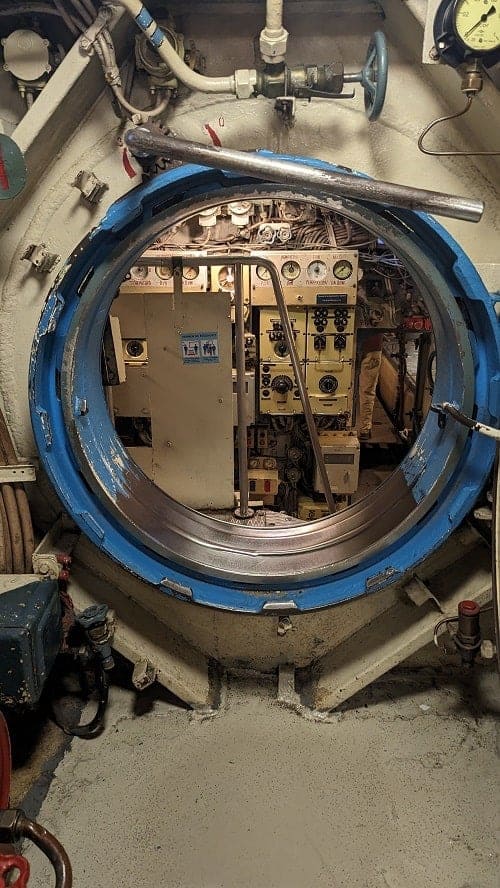 a small tunnel to climb through into another area of a soviet submarine