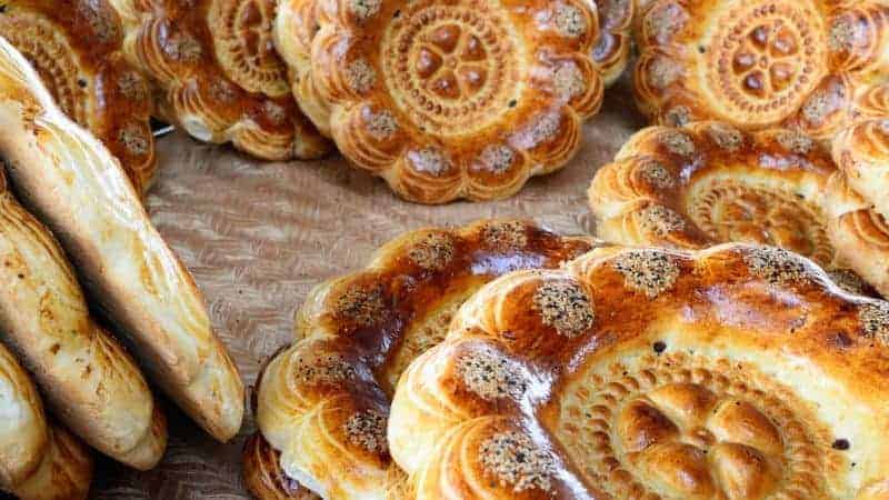 traditional non vegan uzbek bread thats been bake to a beautiful golden color