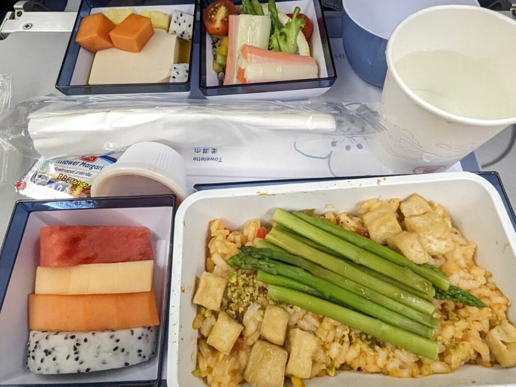 china airlines vegan sweet and sour tofu meal on a flight from Taiwan to Los Angeles.