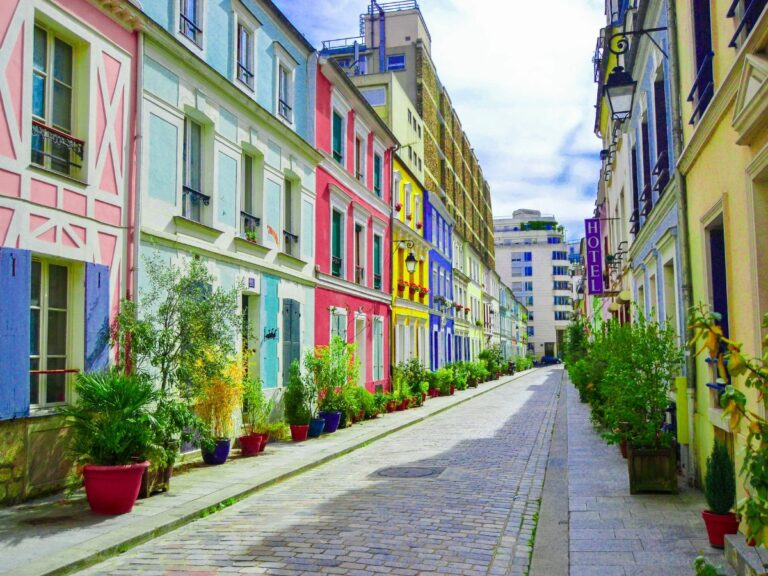 colorful homes along a narrow street in vegan-friendly paris