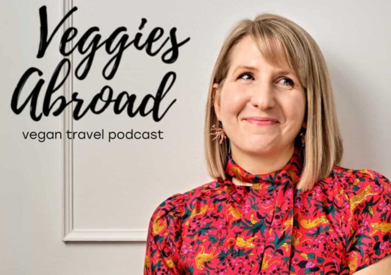 the cover for the veggies abroad vegan travel podcast with rebecca gade sawicki off to the side wearing a red top against a white background