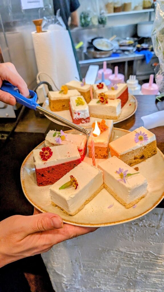 mini birthday cakes on two plates at kem kon in bangkok