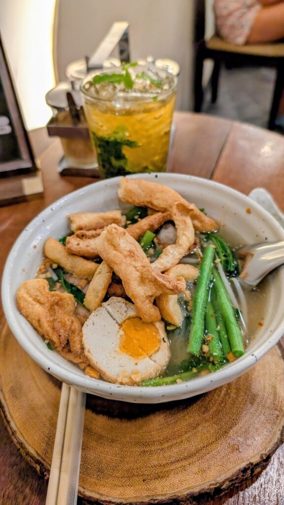 vegan thai noodle soupe topped with a vegan egg at Kem Kon in bangkok