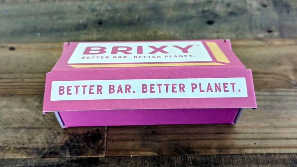 better bar. better planet. motto on the outside of a pink brixy box