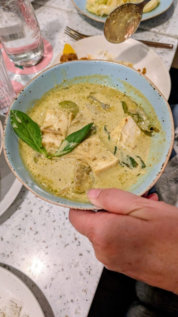 vegan coconut curry at natures charm in bangkok