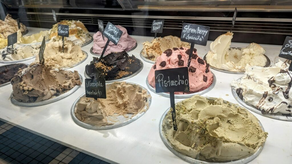 over seven different tubs of vegan and sugar free ice cream at the ice cream shop sugar killer in athens