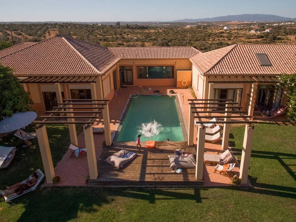 overhead shot of the resort and pool at the vegan-friendly Casa Vale da Lama Eco Resort in portugal