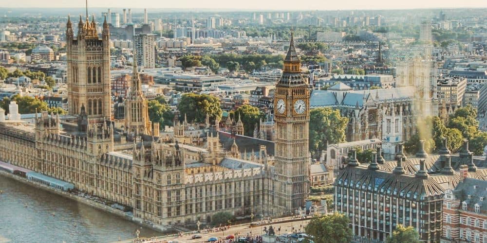 overhead view of big ben, the houses of parliment and the river thames from high above in london