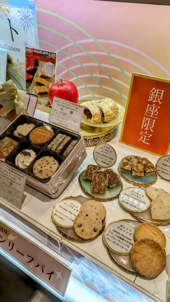 a dessert case filled with vegan cookies at The Vegan Marshmallooow in tokyo