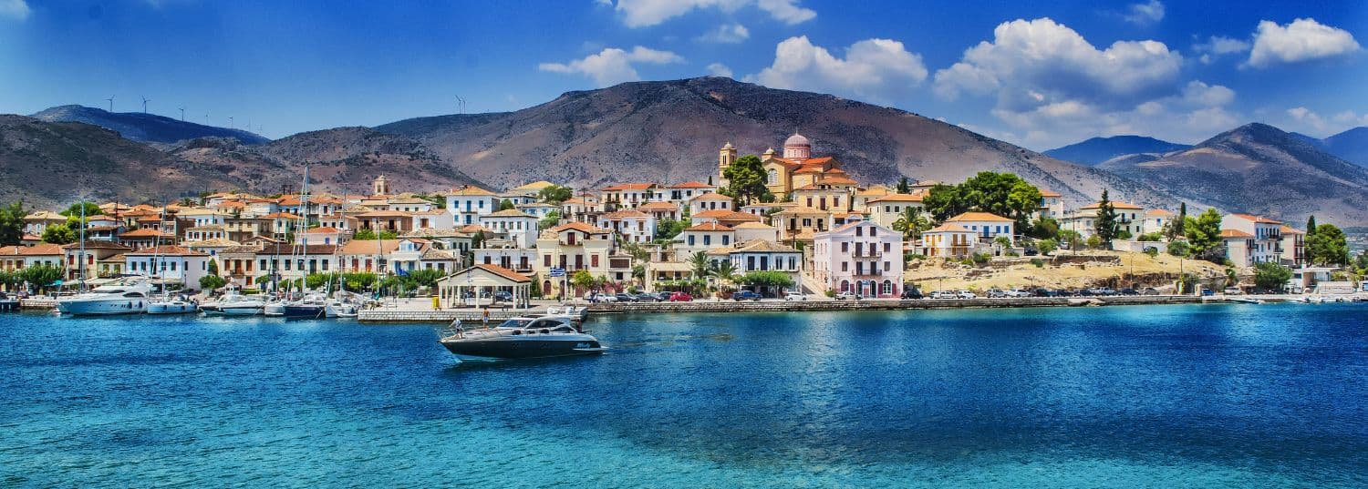 turquoise waters surrounding a quiet island in greece