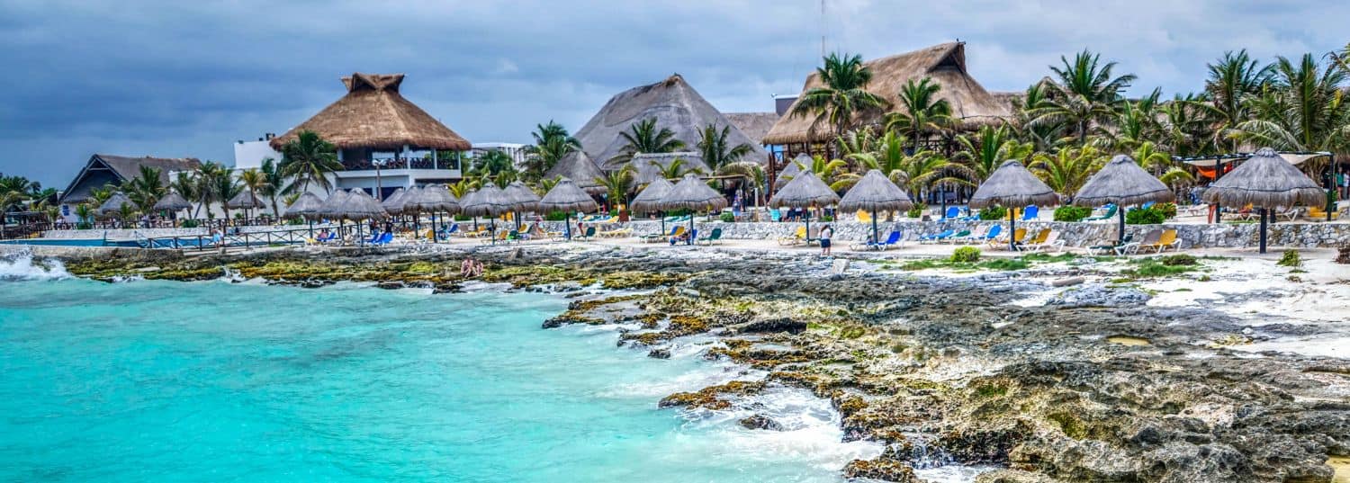 beautiful beach resort surrounded by a rocky beach and turquoise waters in mexico