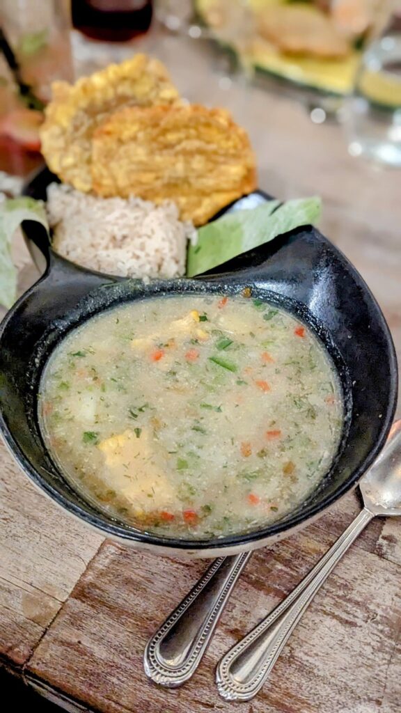 a veganized colombian •	Sancocho stew with plantains and chunks of corn with a crispy arepa at cande cocina in cartegena
