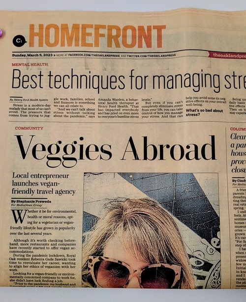 newspaper article highlighting the vegan travel company, veggies abroad