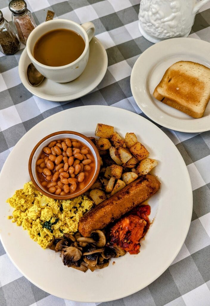 vegan english breakfast platter with beans, tofu scramble, toast, mushrooms and more at the black inn sheep in finger lakes