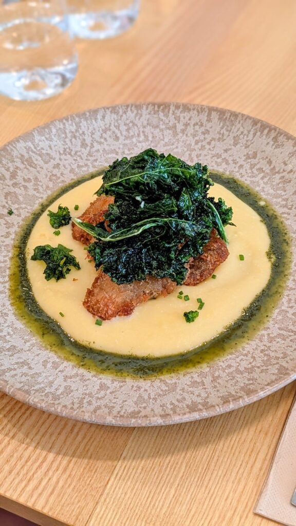 fried vegan mushroom on a bed of polenta and pesto at daterra in baixa porto