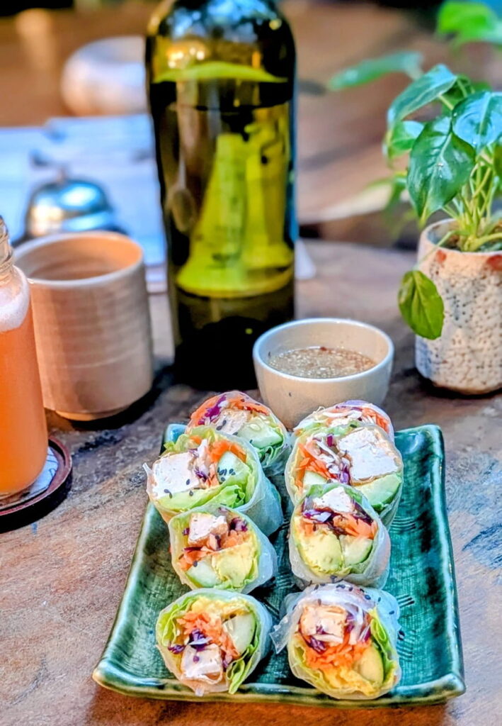 small rectangle plate with colorful vegan rainbow rolls at bong bonlai in Phnom Penh