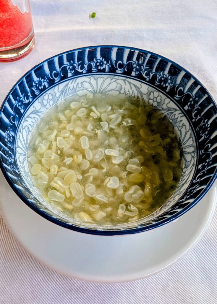 a small bowl with bit of corn in a pudding consistency at magnolia in Phnom Penh