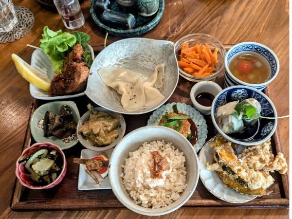 large platter of small vegan japanese dishes
