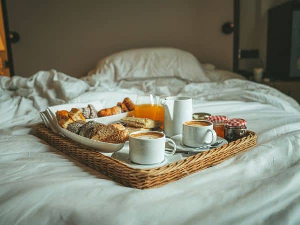 vegan breakfast in bed at a hotel