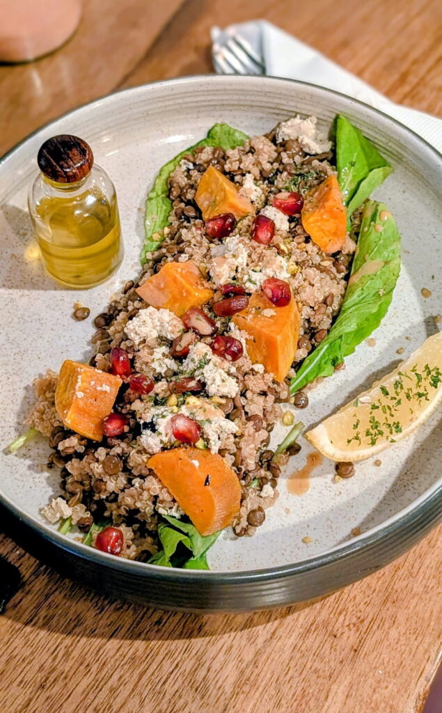 vegan salad in a lettuce leaf with chunks of yellow squash at eat.co in Koh Phangan