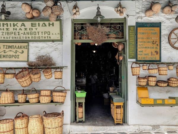 charming storefront covered in wicker baskets in greece