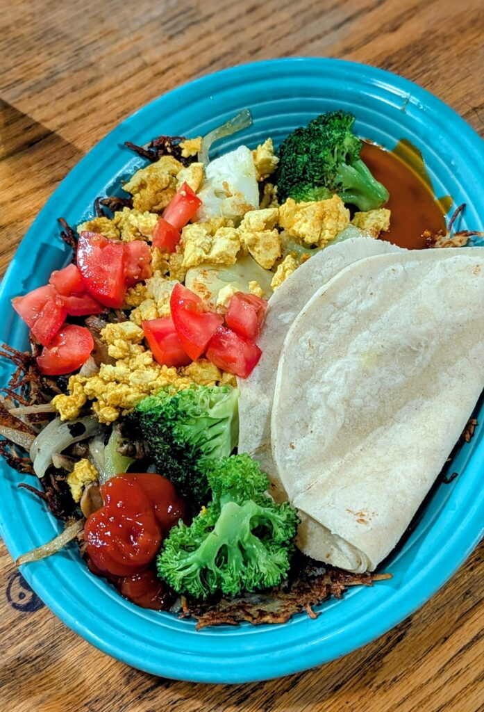 vegan breakfast, helter skelter, with a tofu scramble, hashbrowns and veggies at the hard times cafe in minneapolis