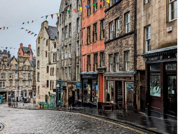 colorful street on a rainy day in edinburgh