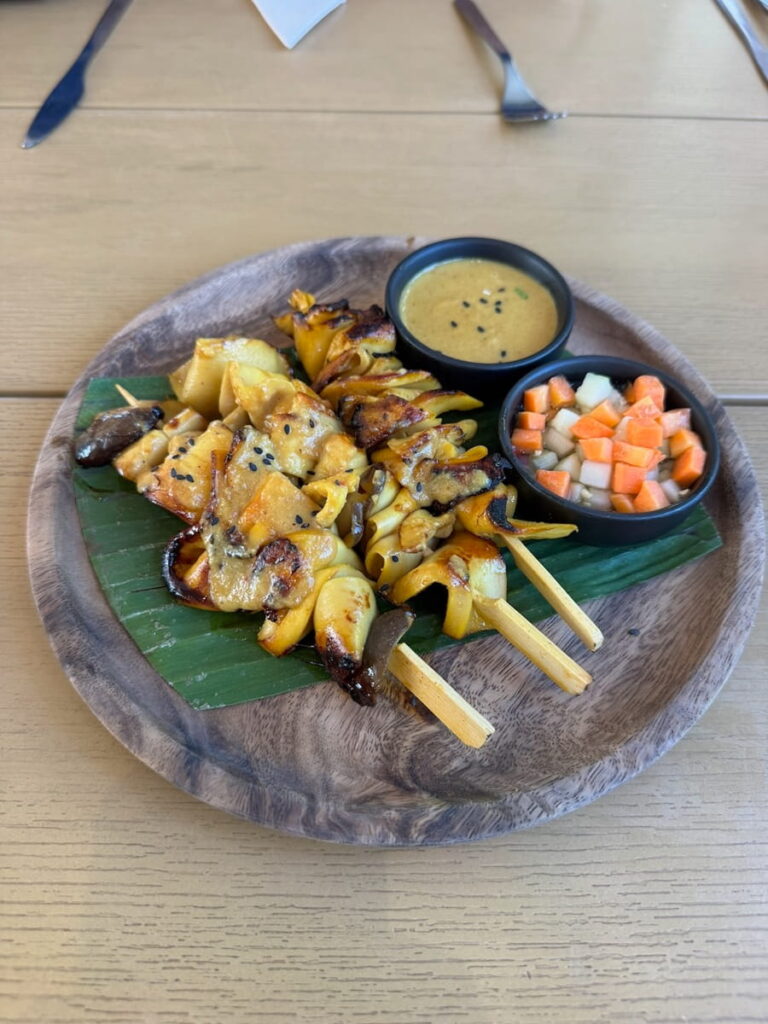mock meat vegan kebabs with a small bowl of sauce in thailand