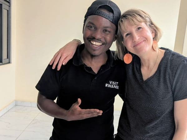 rebecca gade sawicki with veggies abroad tour leader in rwanda
